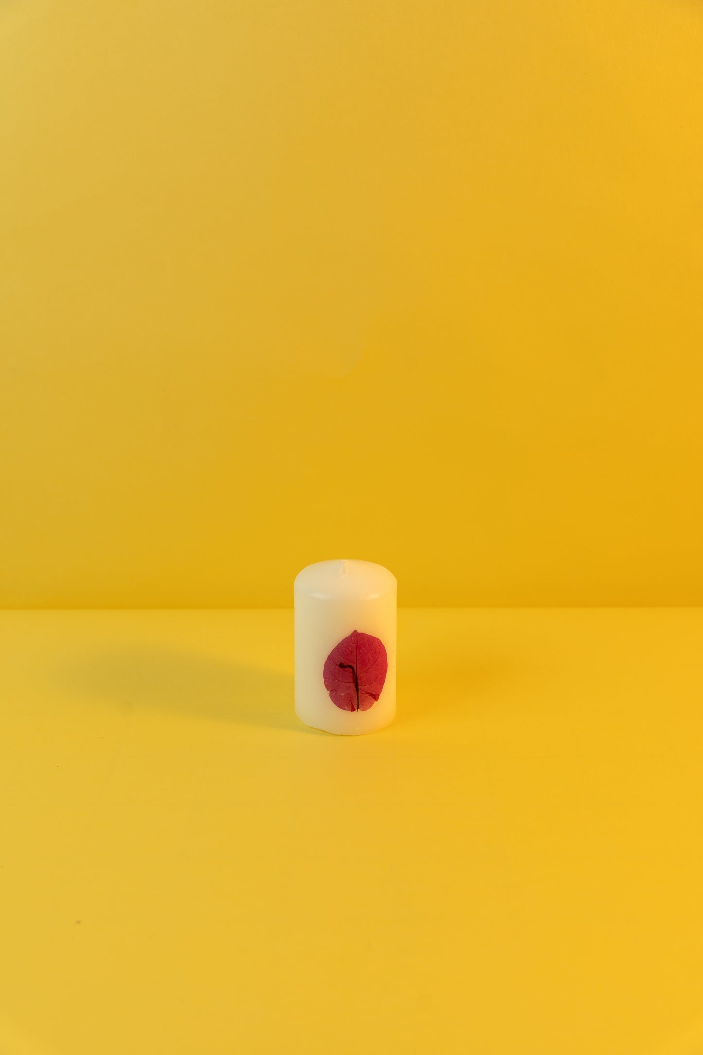 Pillar Candle decorated with dried flowers